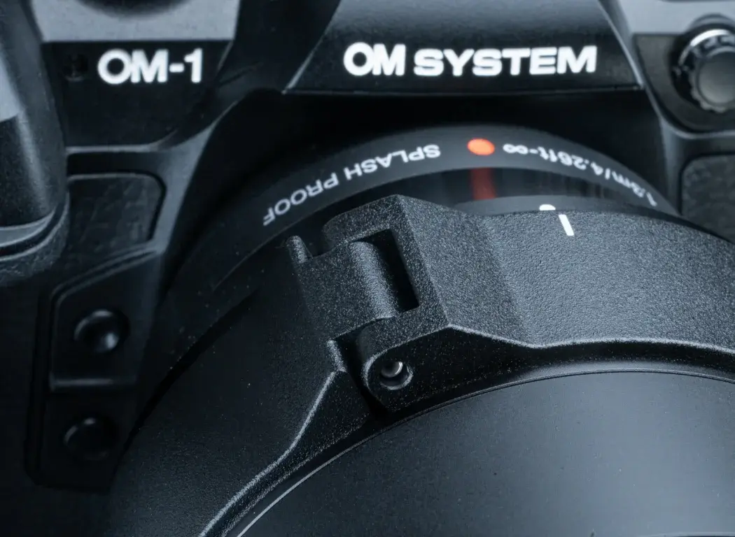 A closeup photo of the lens to show the tripod collar.